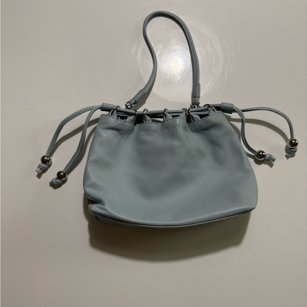 Drawstring pouch bag in leather